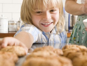 boy reaching for cookies